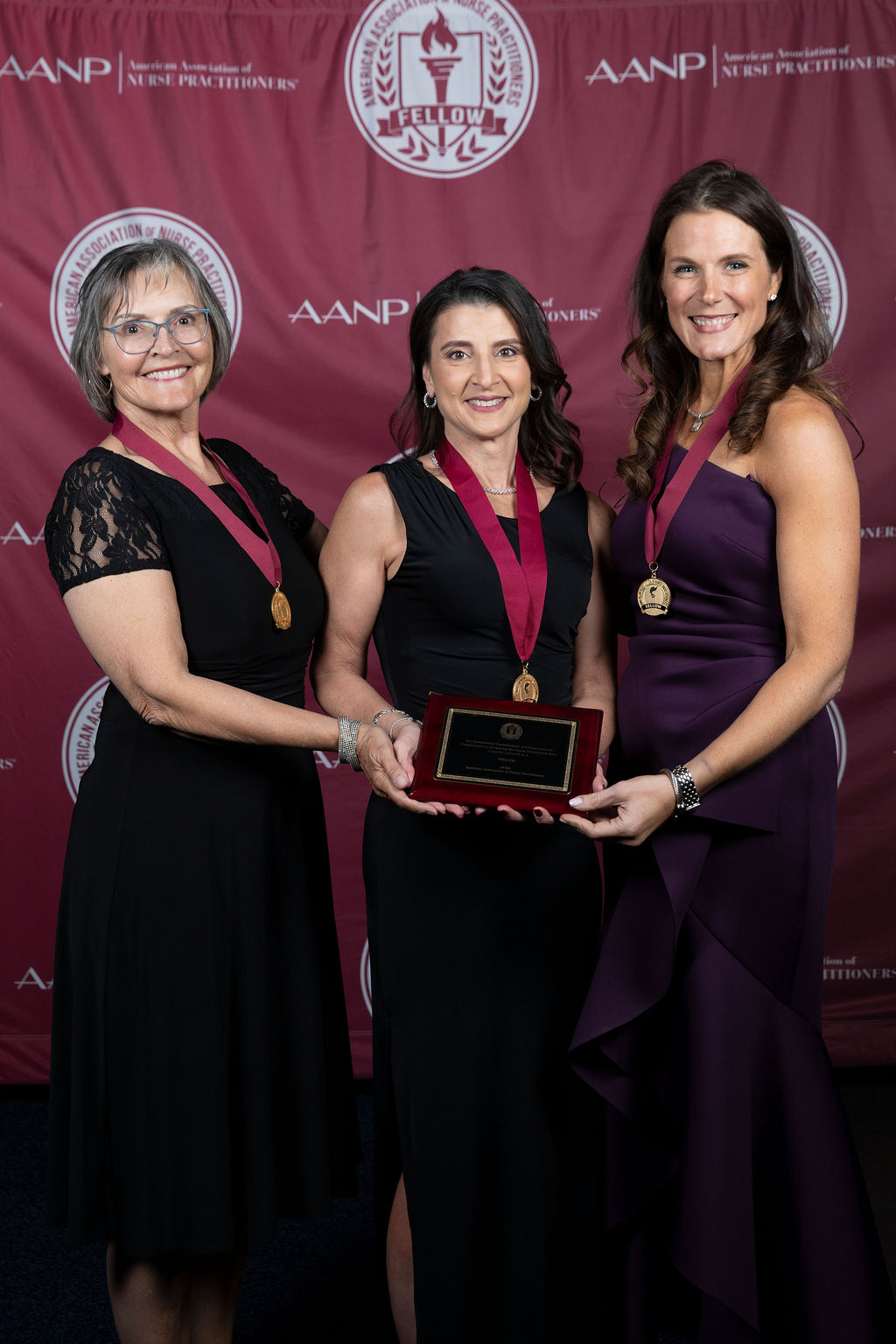 Lucia M. Novak inducted as a Fellow of the American Association of Nurse Practitioners with her sponsors, June 2026